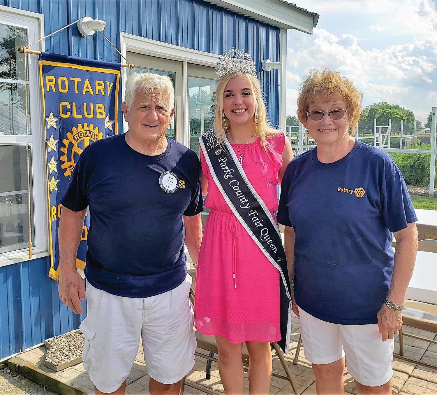 Among the special guests at the recent Rotary Community Garden picnic was the newly crowned Parke County 4-H Fair queen, Natalie Harkrider, center, who was sponsored by Rotary in the pageant. Shown with the 4-H Fair queen are Rotarians Sam Brook, left, and Judy Brook, who are members of the leadership team for the garden.